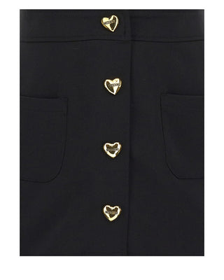 Moschino Salopette con bottoni a cuore logati HDJ03G