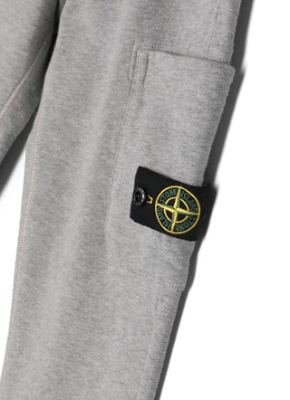 Stone Island Pantaloni jogger con logo 801661540
